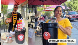 man in bee costume and woman holding mosquito bucket